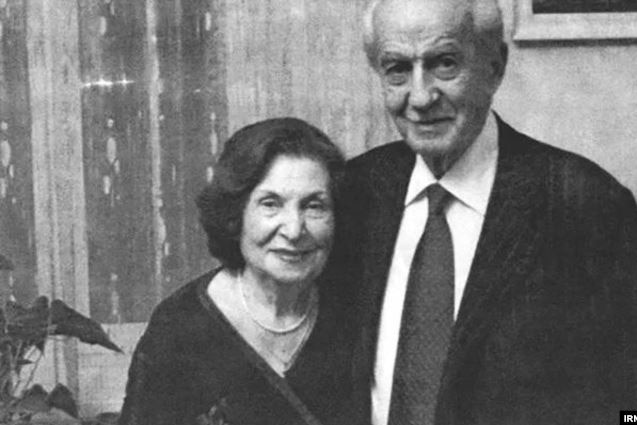 A black-and-white photo of married couple Goar and Gevork Vartanyan standing close together dressed smartly