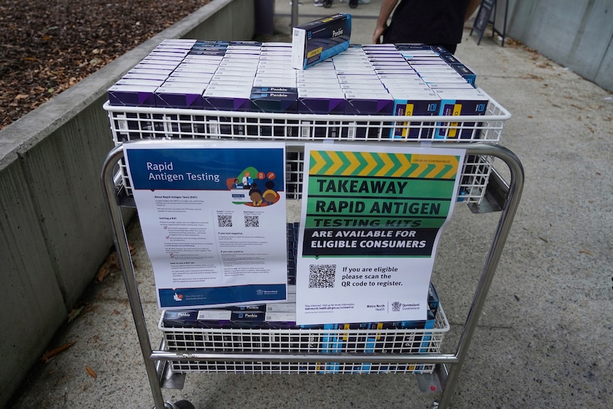 Trolley of free RAT packs available to eligible people at the Royal Brisbane and Women's Hospital in Brisbane.