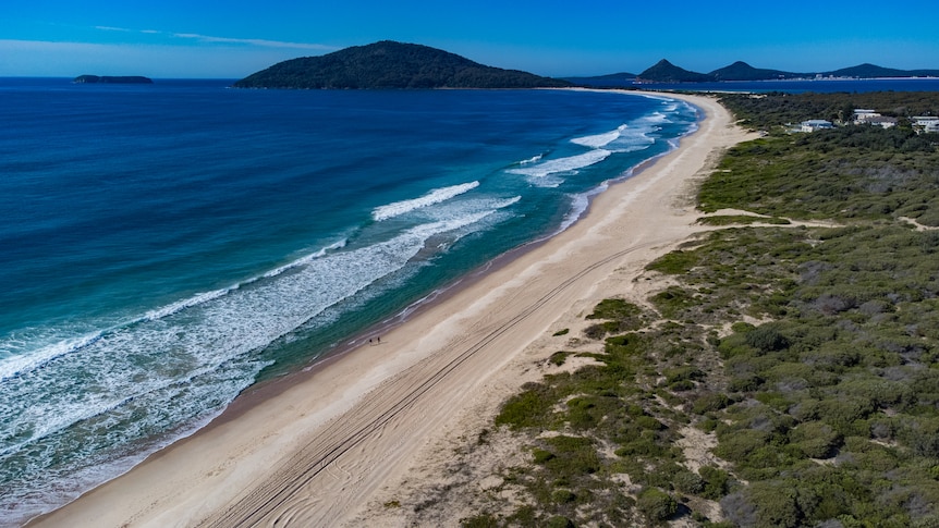 Sweeping coastline beach front at Hawks Nest