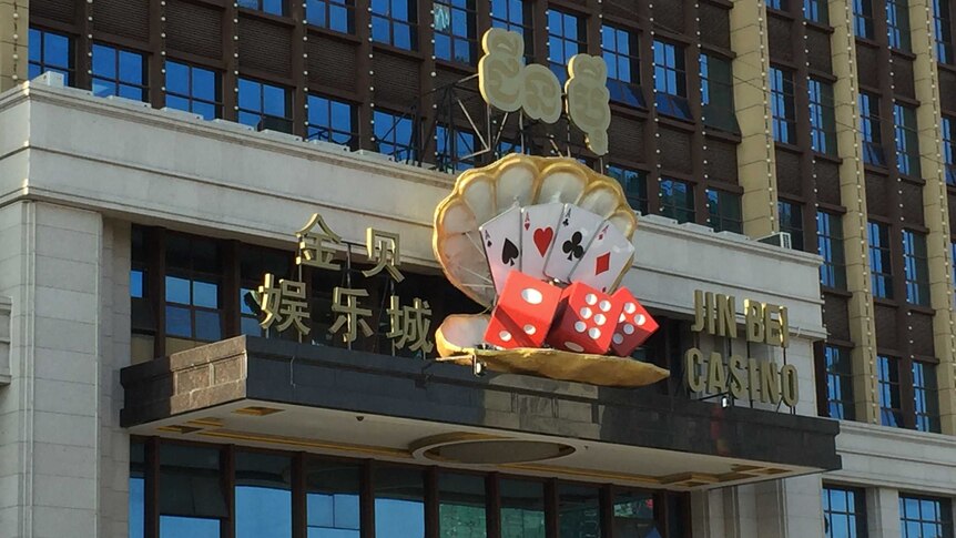 A gold sign marks the entrance to the Jin Bei Hotel and Casino in Cambodia.