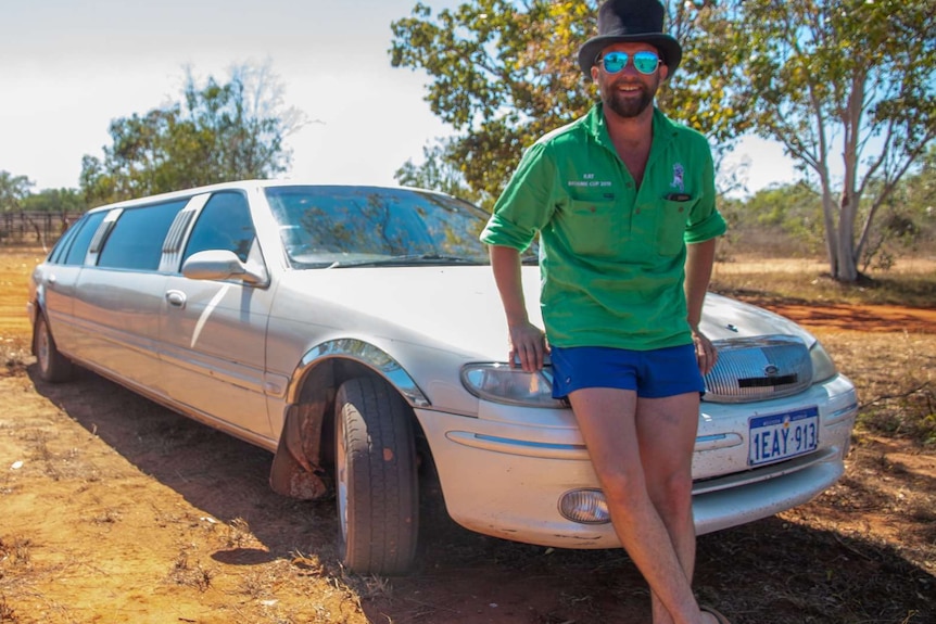 Limousine owner 'Rat' White stands with his limo.