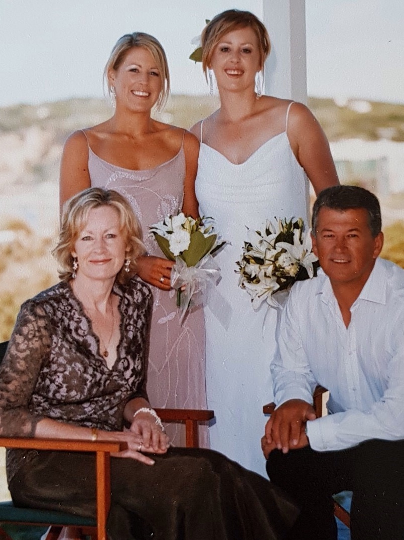 A family portrait of a bride, her sister and mum and dad.