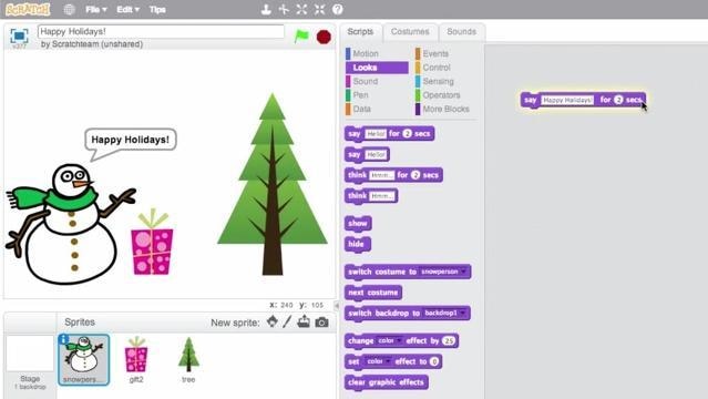 Scratch edit window shows image of snowman and tree, snowman has speech bubble