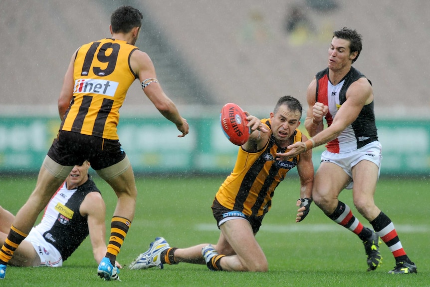 Brian Lake fights for the sherrin at the MCG