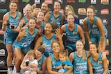 The Southside Flyers celebrate their WNBL grand final win over the Fire in Townsville.
