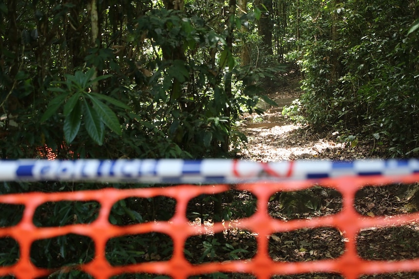 A photo shows a set of stairs near the track where the couple's bodies were found.