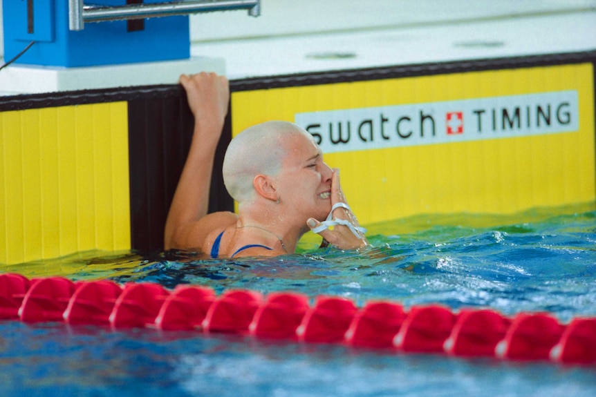 Swimmer Casey Legler looks upset after finishing last in a swimming heat.