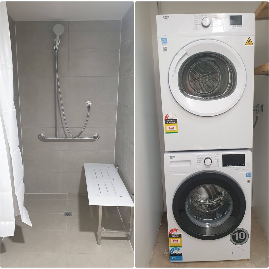 A shower on left and washer and dryer on right. 