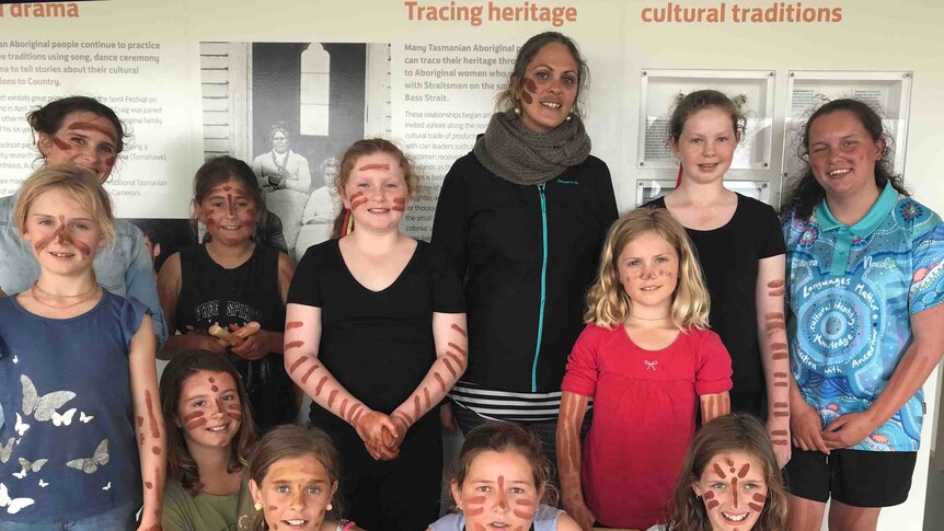 Tasmanian Aboriginal youngsters with ochre on their faces