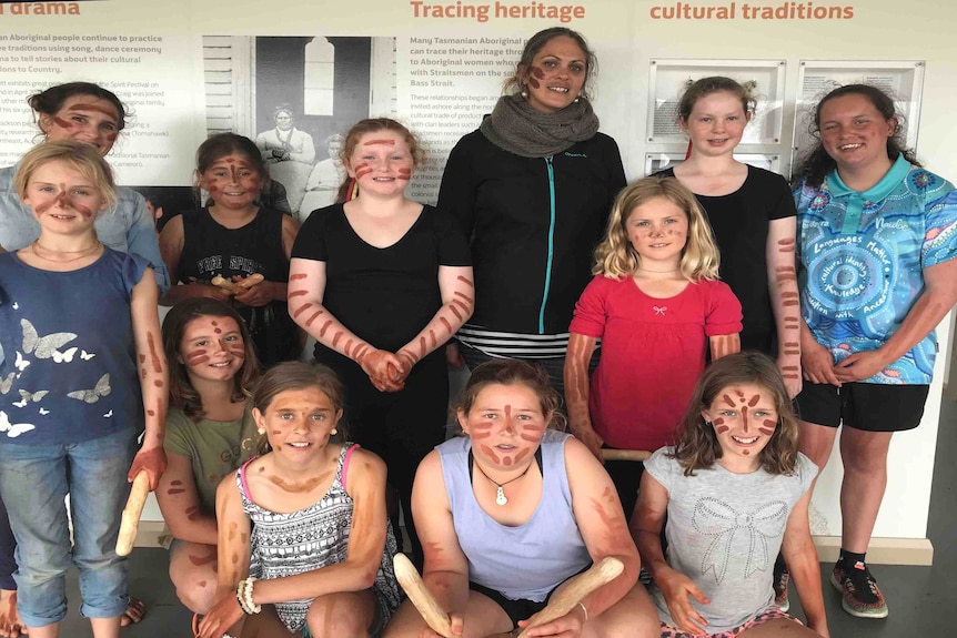 Tasmanian Aboriginal youngsters with ochre on their faces