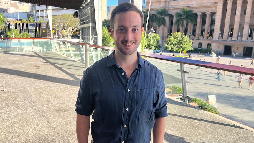 Stephen standing in King George Square.