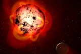 Illustration of a red dwarf star with exoplanet