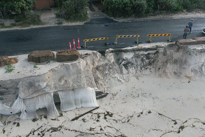 A beach shows the signs of erosion.