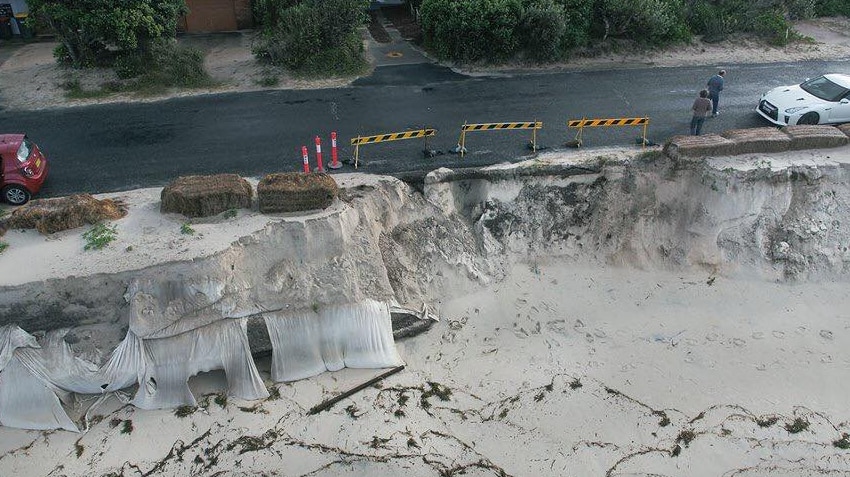 A beach shows the signs of erosion.