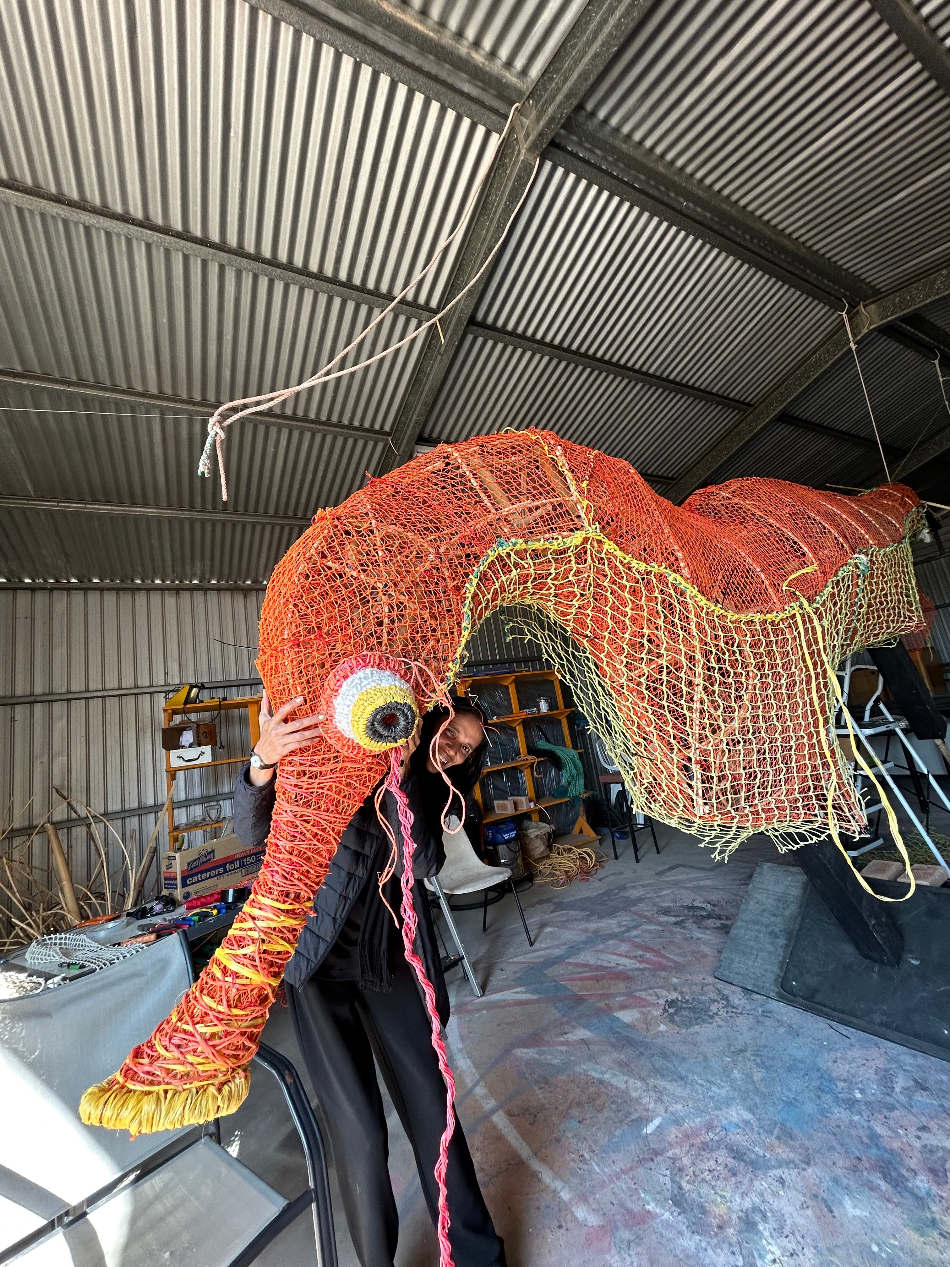 A coloured leafy sea dragon statue made from marine debris.