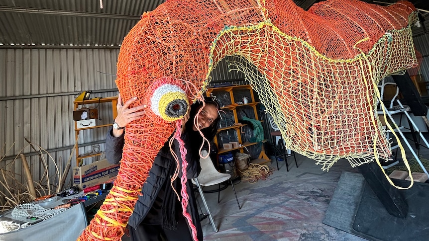 A coloured leafy sea dragon statue made from marine debris.