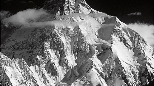 Book cover - black and white photo of a mountain peak covered in snow