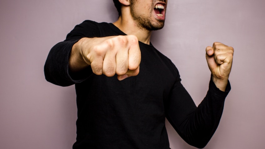 A man throwing a punch.