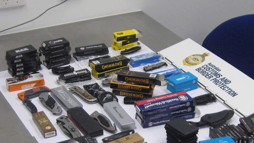 Eighty-five confiscated knives are put on display after being seized at Melbourne Airport