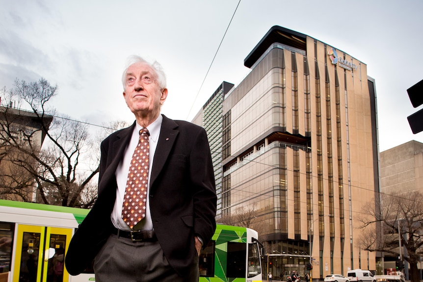 Peter Doherty stands outside of The Doherty Institute in Melbourne.