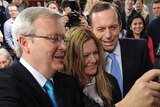 Kevin Rudd and Tony Abbott in a 'selfie' with forum audience member
