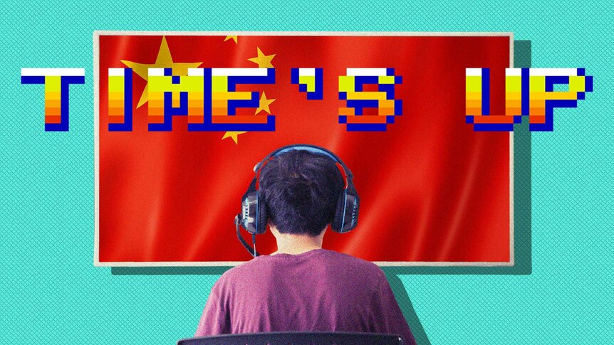 A child wearing gaming headphones faces a big screen showing a Chinese flag on it with the word 'Time's Up' across it.