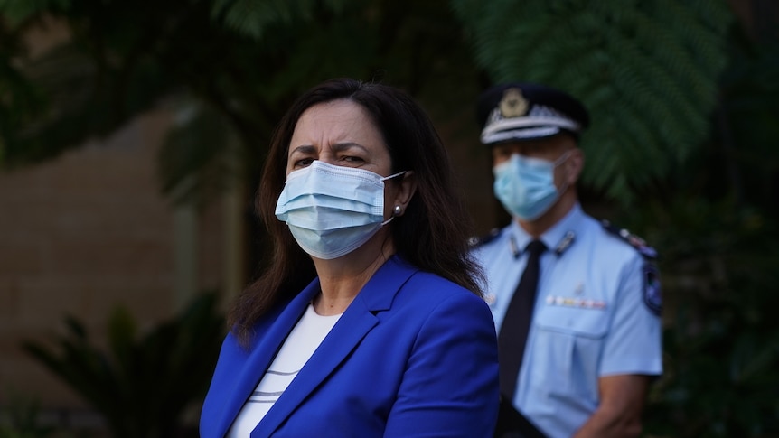 Queensland Premier Annastacia Palaszczuk wearing a face masks.