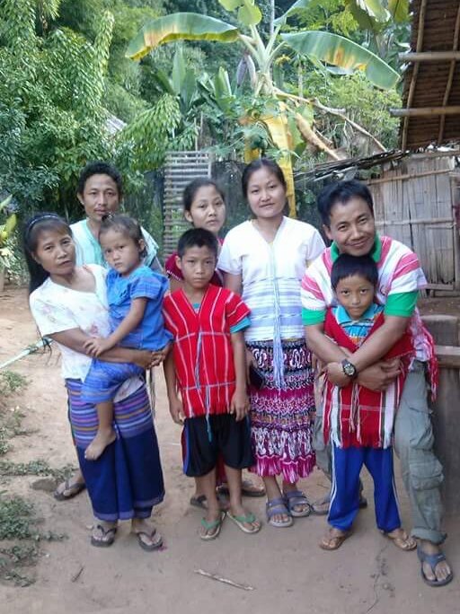 A Thai family gather together.