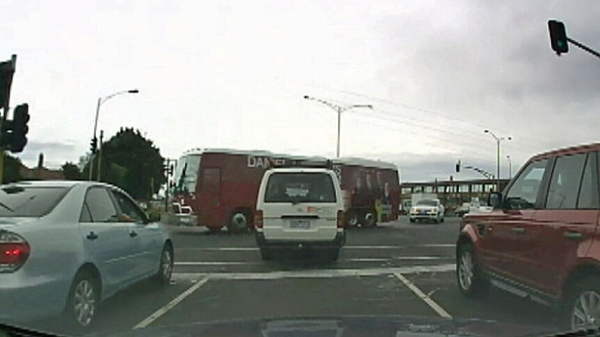 Labor's big red campaign bus appears to run a red light