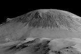Dark streaks flowing downhill on Howitz crater on Mars