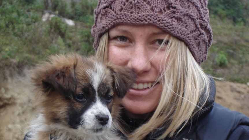 Justine Damond with a dog.