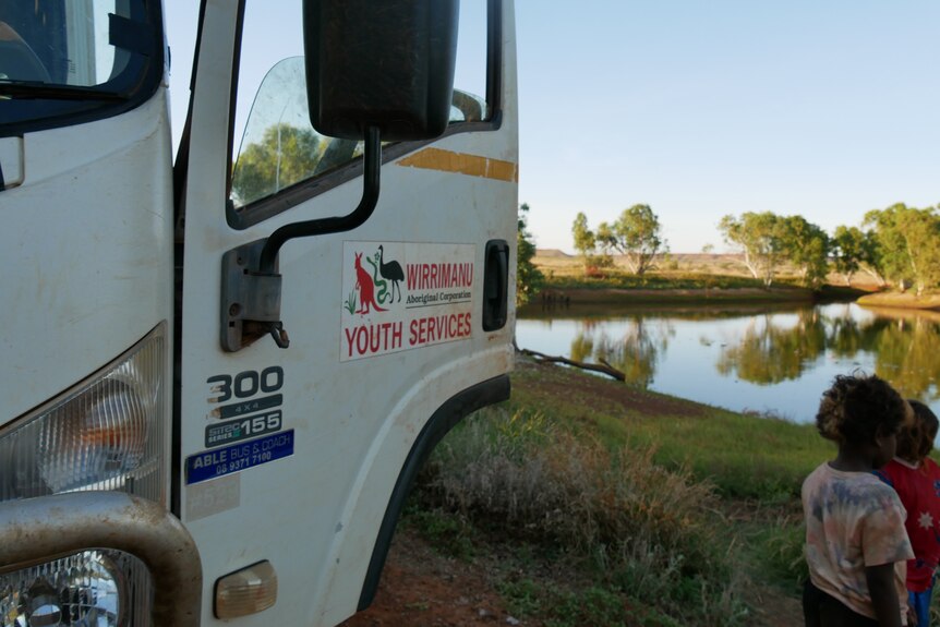 Wirrimanu Youth Services' bus at Balgo dam.