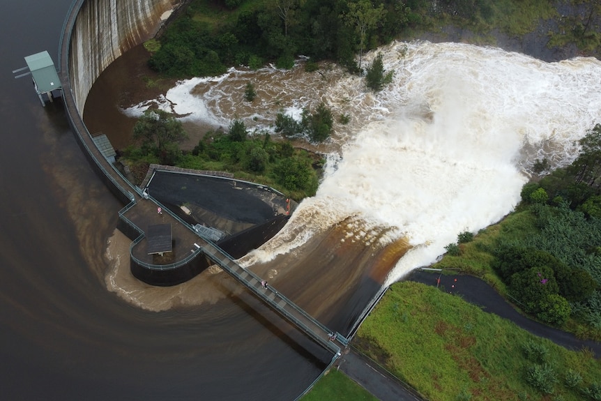 Water pours over the spillway at Moogerah Dam near Boonah 