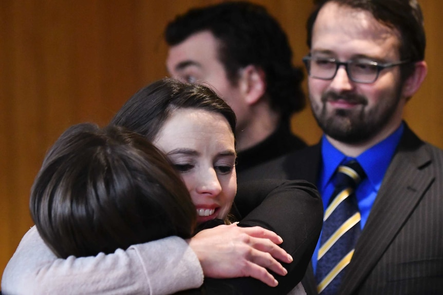 Rachael Denhollander hugs Detective Lieutenant Andrea Munford