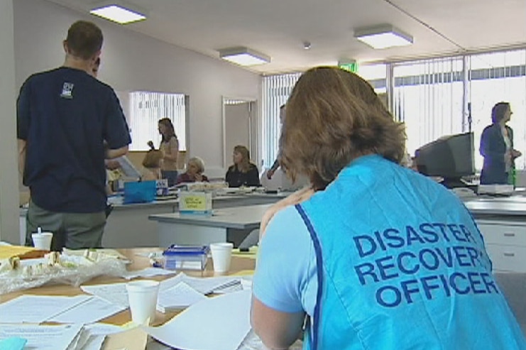 Video still: staff and clients at the Canberra Bushfire Recovery Centre in Lyons after the devastating fires in 2003