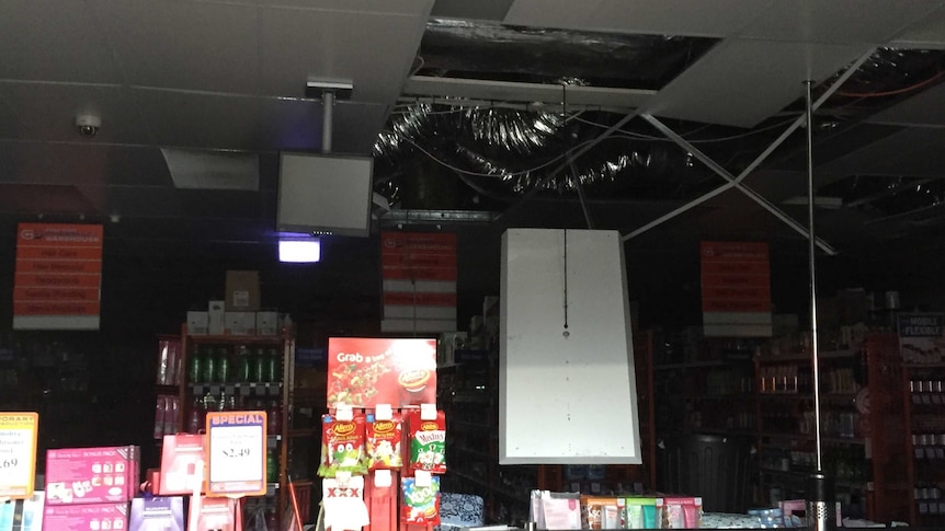 A collapsed roof inside a chemist at South Nowra