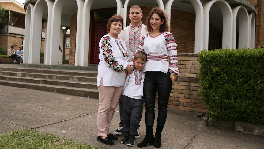 a family of two women, and two boys one younger and one older