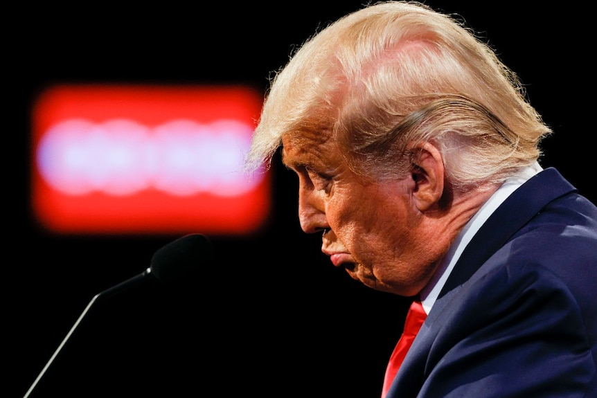 President Donald Trump reacts during the second and final presidential debate