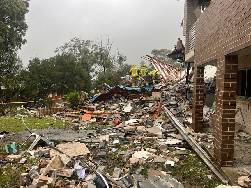 Firefighters search rubble at Whalan house after explosion 010624