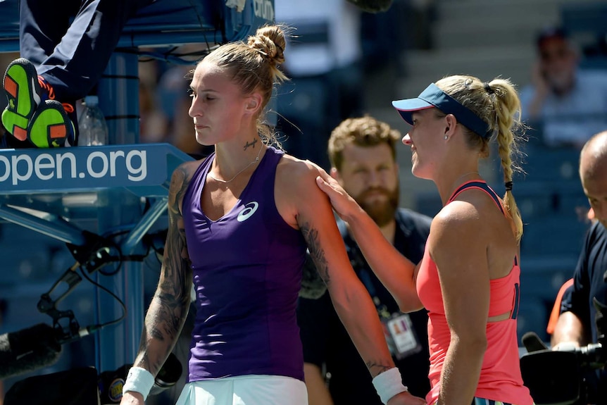 Hercog and Kerber walk off the court