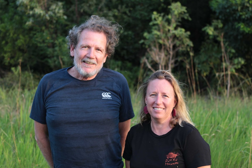Archaeologists Bryce Barker and Lynley Wallis pictured at the site of a former police camp in Queensland.
