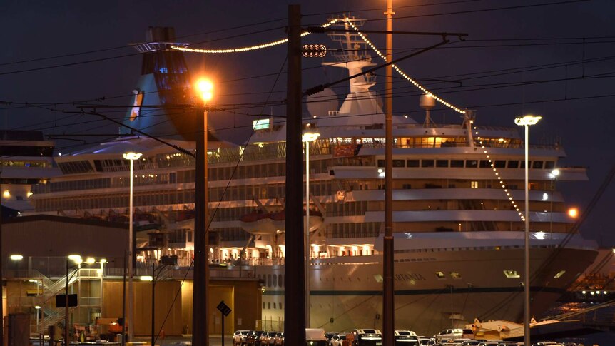 The Artania cruise ship docked at Fremantle Port before dawn.