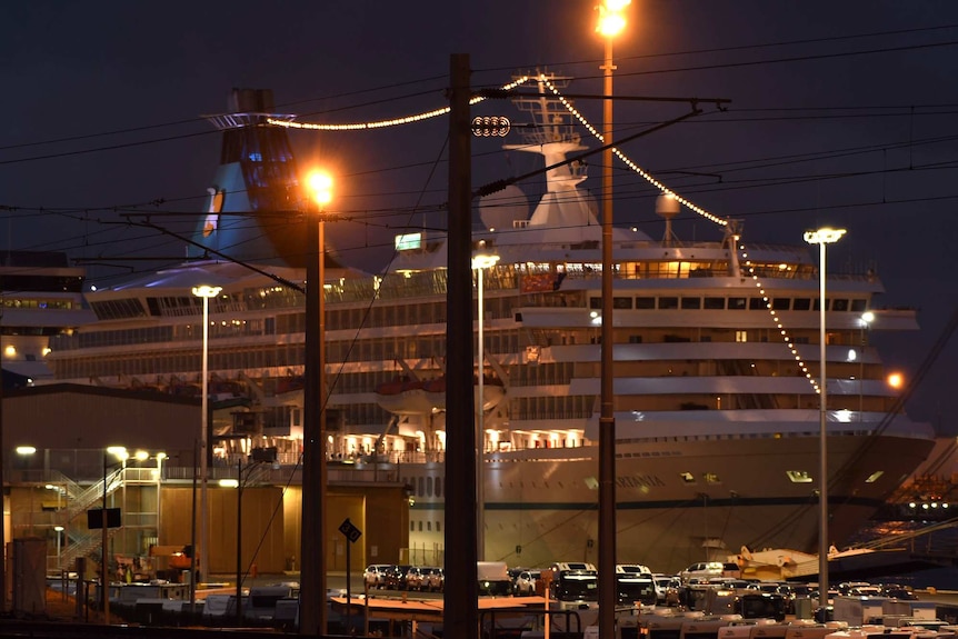 The Artania cruise ship docked at Fremantle Port before dawn.