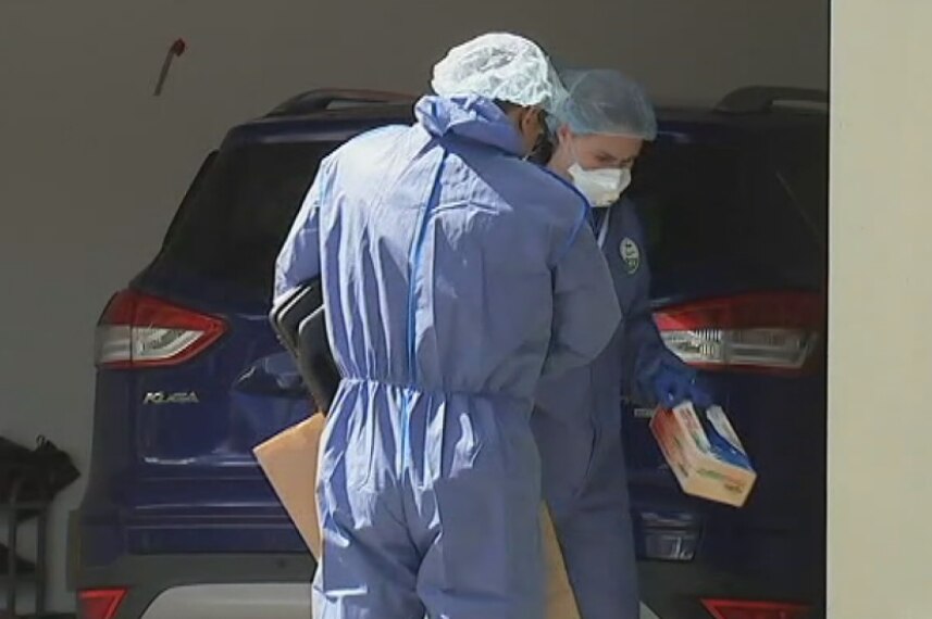Forensic crews at the scene of a fatal stabbing of a baby girl in Parkinson.