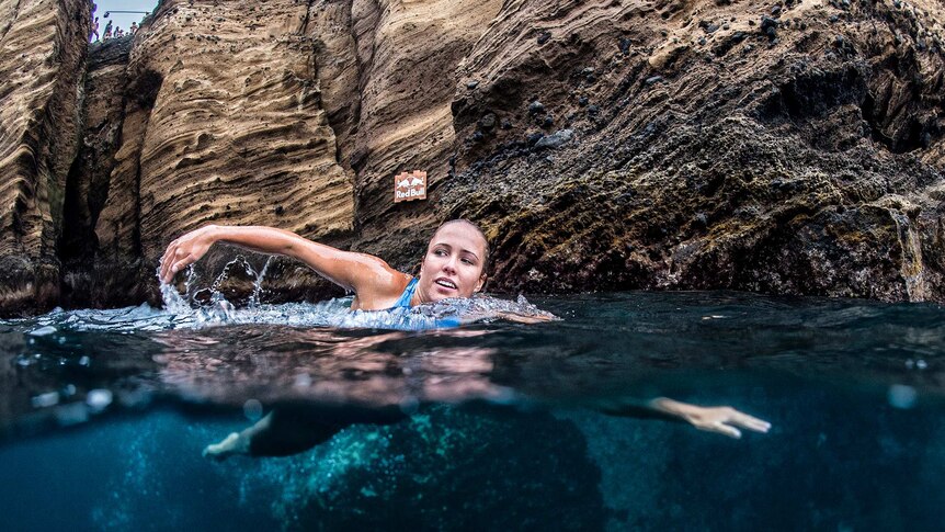 Helena Merten swims after a dive in Sao Miguel in Portugal.