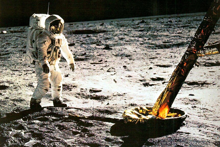 Astronaut Buzz Aldrin walking on the moon's surface in 1969.