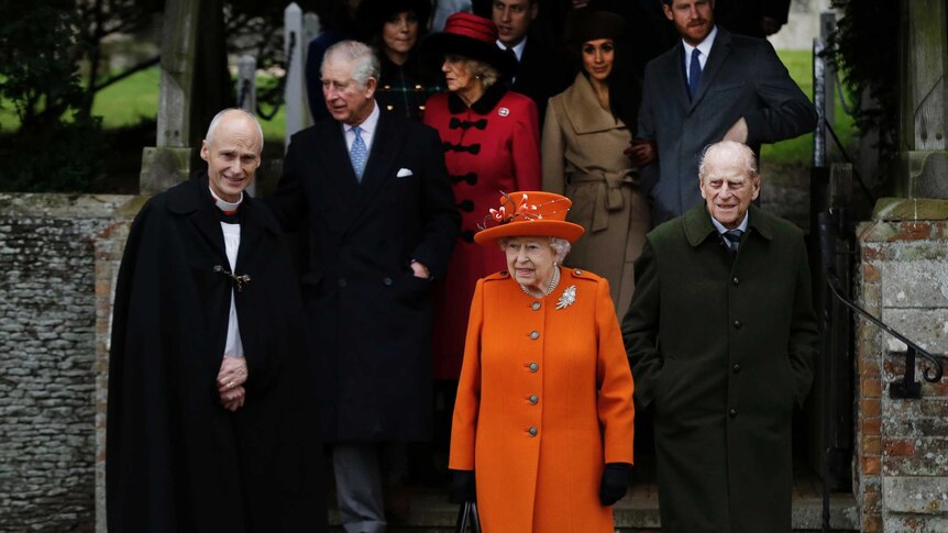 Britain's Queen Elizabeth II, Prince Philip and Prince Charles attend Christmas Day service