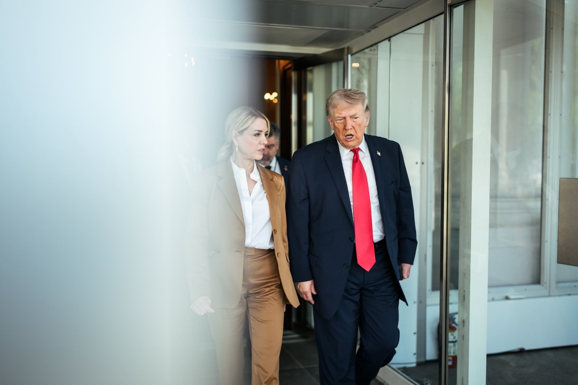 A man and woman walk side by side.