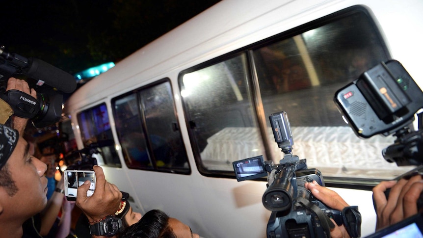 Coffin in ambulance after execution