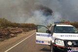 The Barkly highway between Mount Isa and Cloncurry was closed for most of Tuesday while fire crews back-burned in the region.
